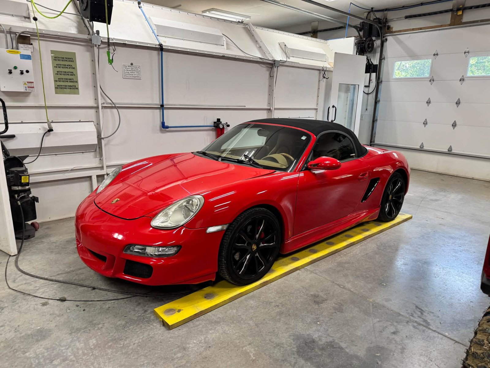 Red Porsche in the Ponca Hills Collision shop